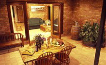The Secret Garden Cottage - E Caravan Parks 0