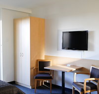 Mid City Motor Inn - E Caravan Parks