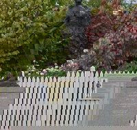 Alexander Cameron Statue - E Caravan Parks