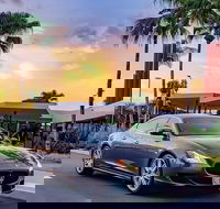 Maserati Quattroporte Limousine Transfer Cairns Airport to City - E Caravan Parks