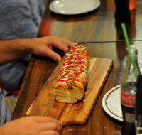Paesano's Pizzeria with Double Dogs - Mentone - E Caravan Parks