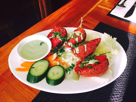 Gulmohar Indian Restaurant - E Caravan Parks 0