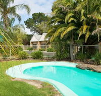 Tropicana Motor Inn - E Caravan Parks