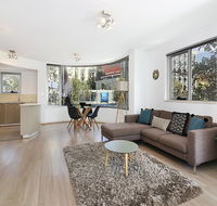 Lower Bridge and Sails - Executive 2BR Darlinghurst Apartment with Balcony and Rooftop Views - E Caravan Parks
