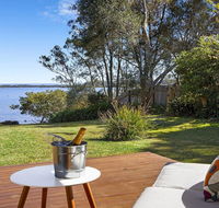 Braeside - waterfront fireplace - E Caravan Parks