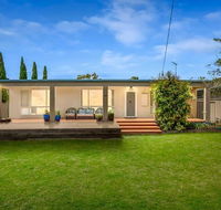 Casual Beachin It Family Getaway- with Bungalow on Beachfront - E Caravan Parks