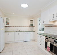 Happy Tails'  55 Pantowora Street - pet friendly air conditioned - E Caravan Parks