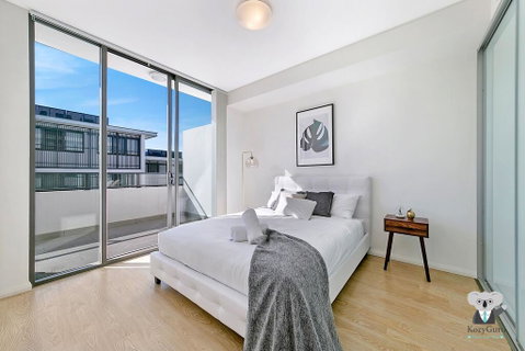 KOZYGURU NORTH RYDE MACQUARIE PARK 2 BEDROOM APT + FREE PARKING NNR009 - E Caravan Parks 2