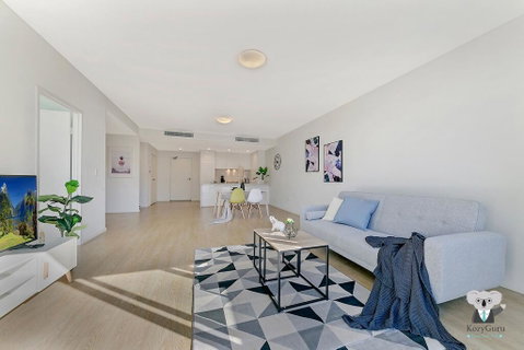 KOZYGURU NORTH RYDE MACQUARIE PARK 2 BEDROOM APT + FREE PARKING NNR009 - E Caravan Parks 0
