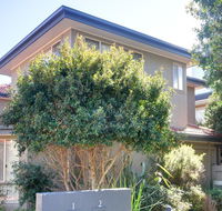 One Street Back from the Surf Beach - E Caravan Parks