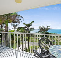 Views of Moreton Island from balcony at Beachside Haven Rickman Pde Woorim - E Caravan Parks