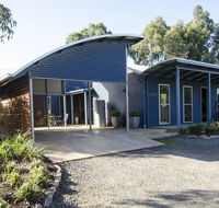 Corrugated Cottage - E Caravan Parks