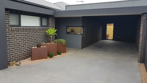 At Home Apartments - E Caravan Parks 0